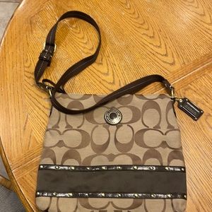 Like new Coach purse. Adjustable length strap. Inside immaculate.